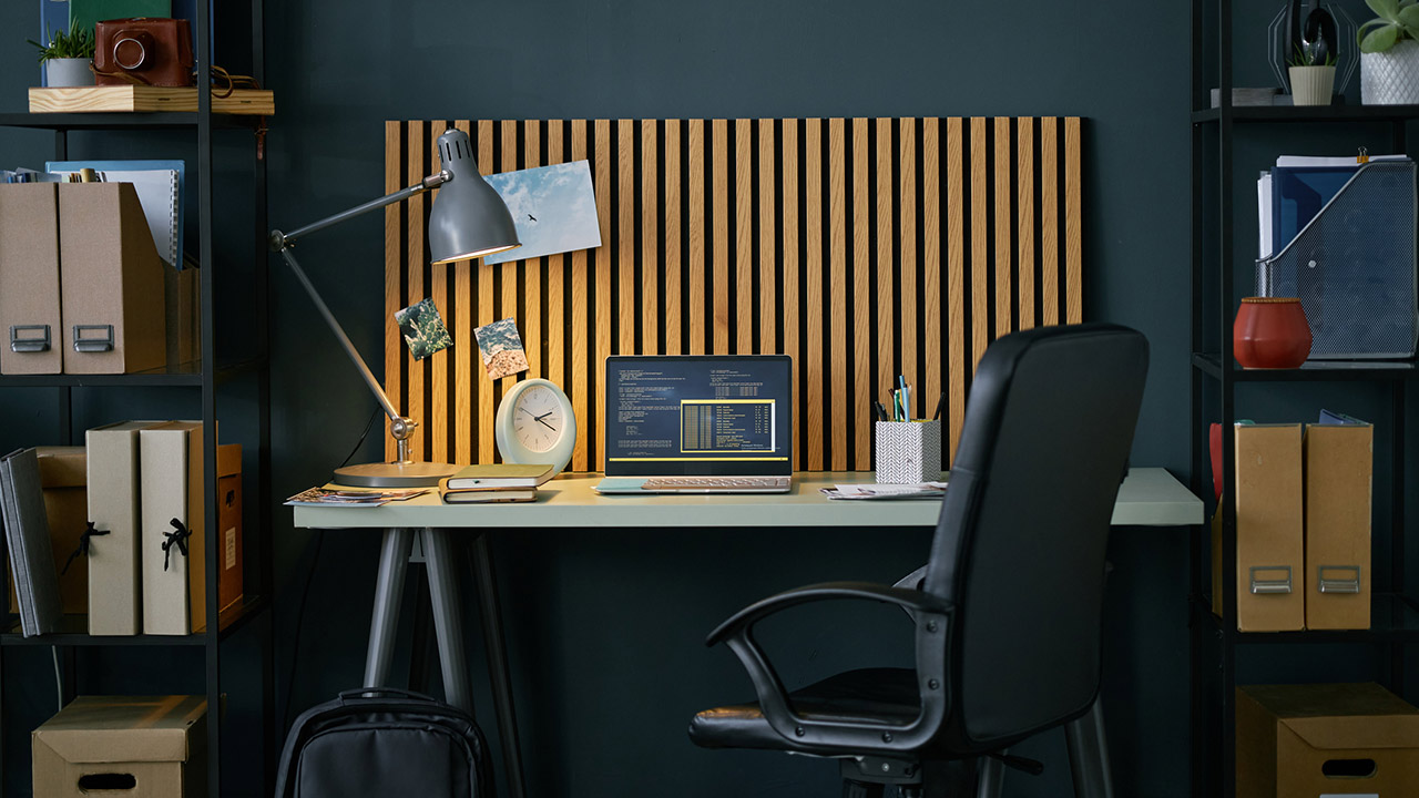 Organized Home Office With Stylish Wooden Backdrop stock photo