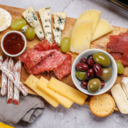 A styled charcuterie or snack board on a dining table