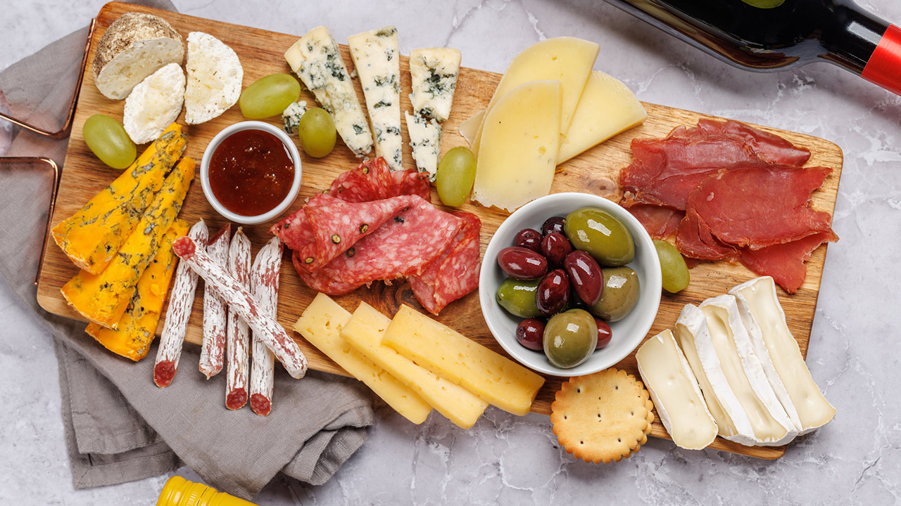 A styled charcuterie or snack board on a dining table